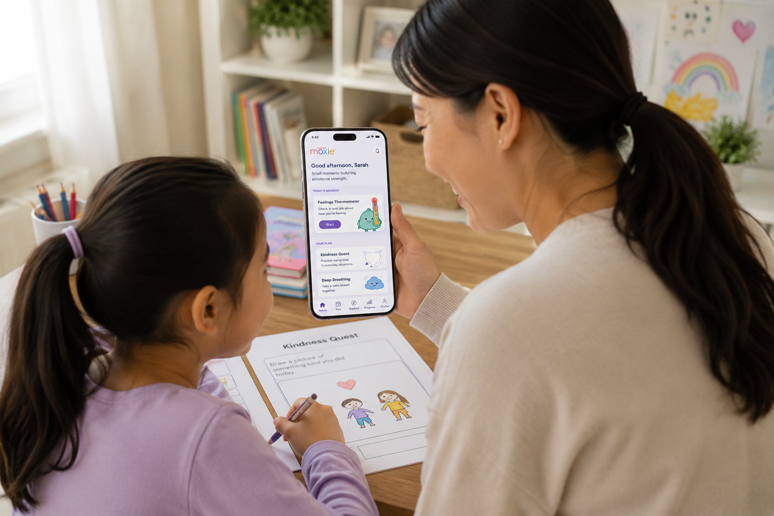 mom using the moxie app with her daughter